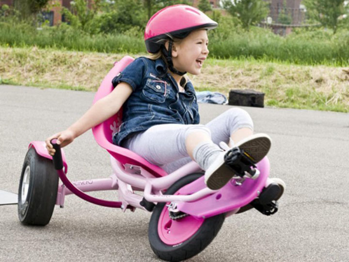 Exit Rennrad und Dreirad pink